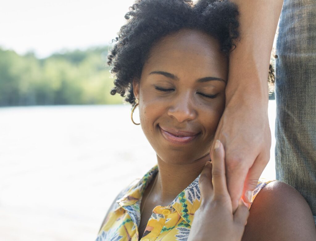 Woman supported by partner to benefit mental wellbeing 